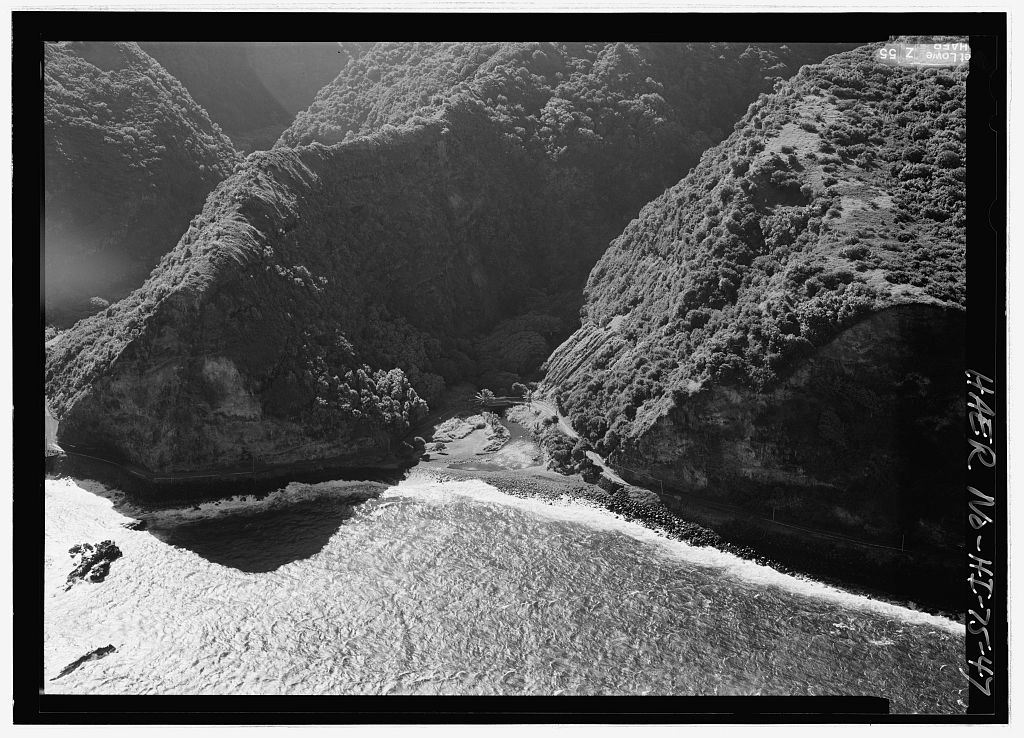 Historic aerial view of the Hāna Belt Road and Kalepa Bridge along Maui’s rugged coast