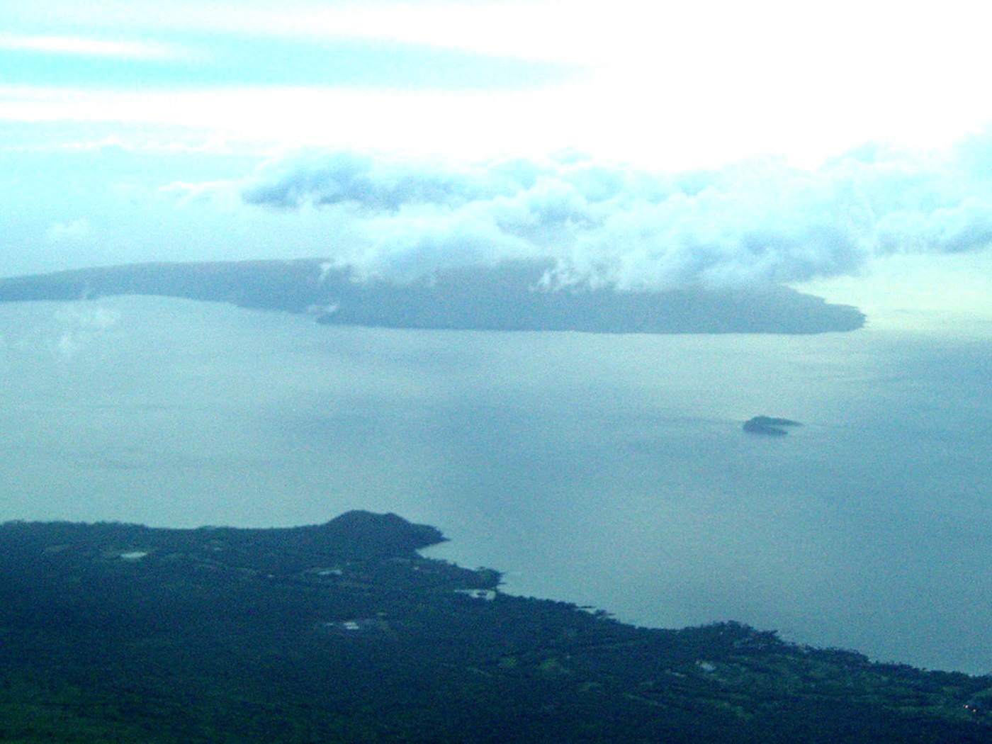 Aerial view across Mākena toward Molokini and Kahoʻolawe