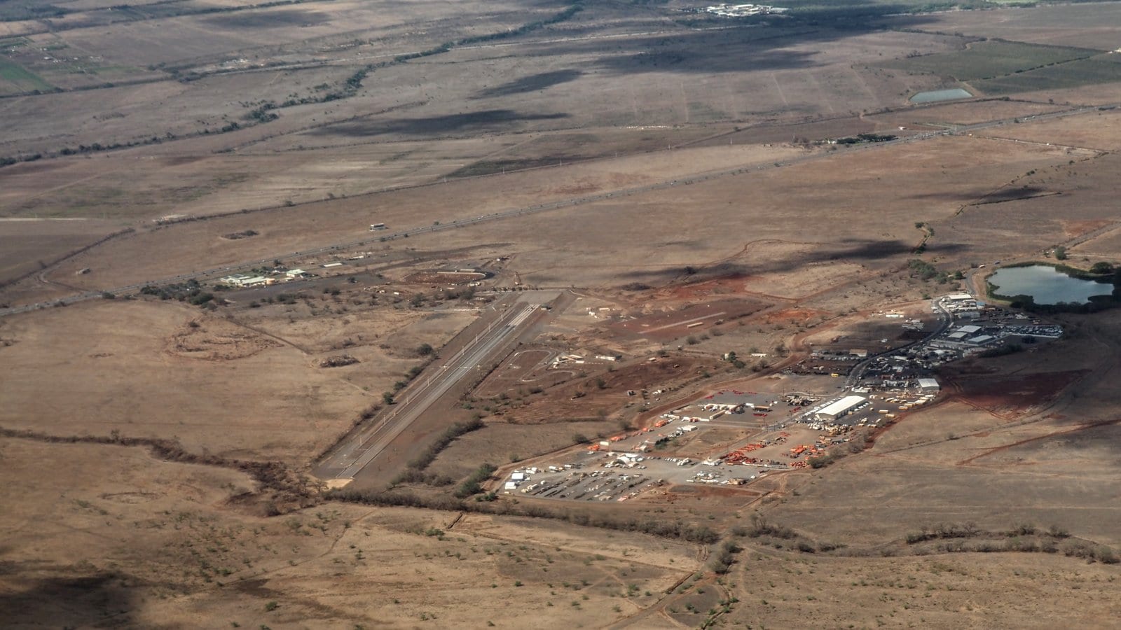 Aerial view of Maui Raceway Park on a surviving runway of historic Puʻunēnē Airport